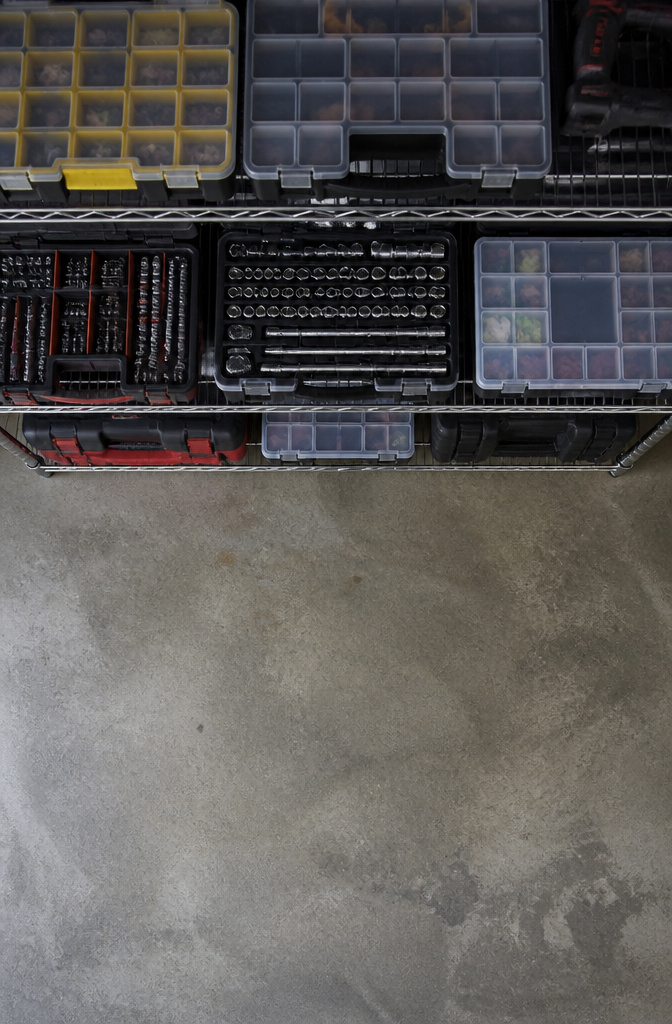 A tool organization kit with drawers and dividers for tools.