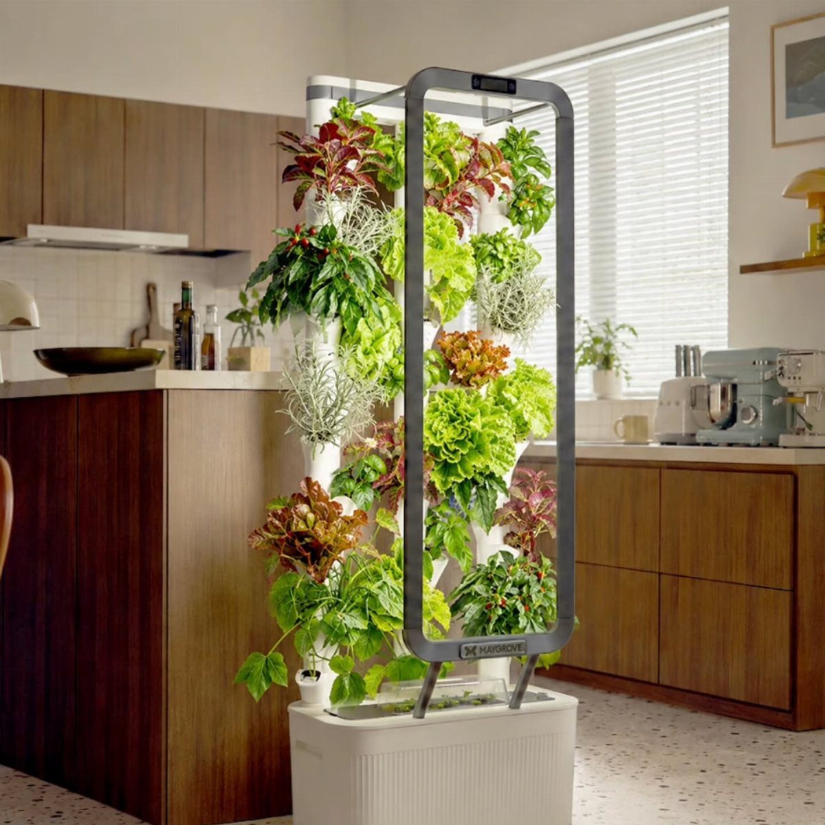 Vertical hydroponic herb garden with LED grow lights in a modern kitchen setting.